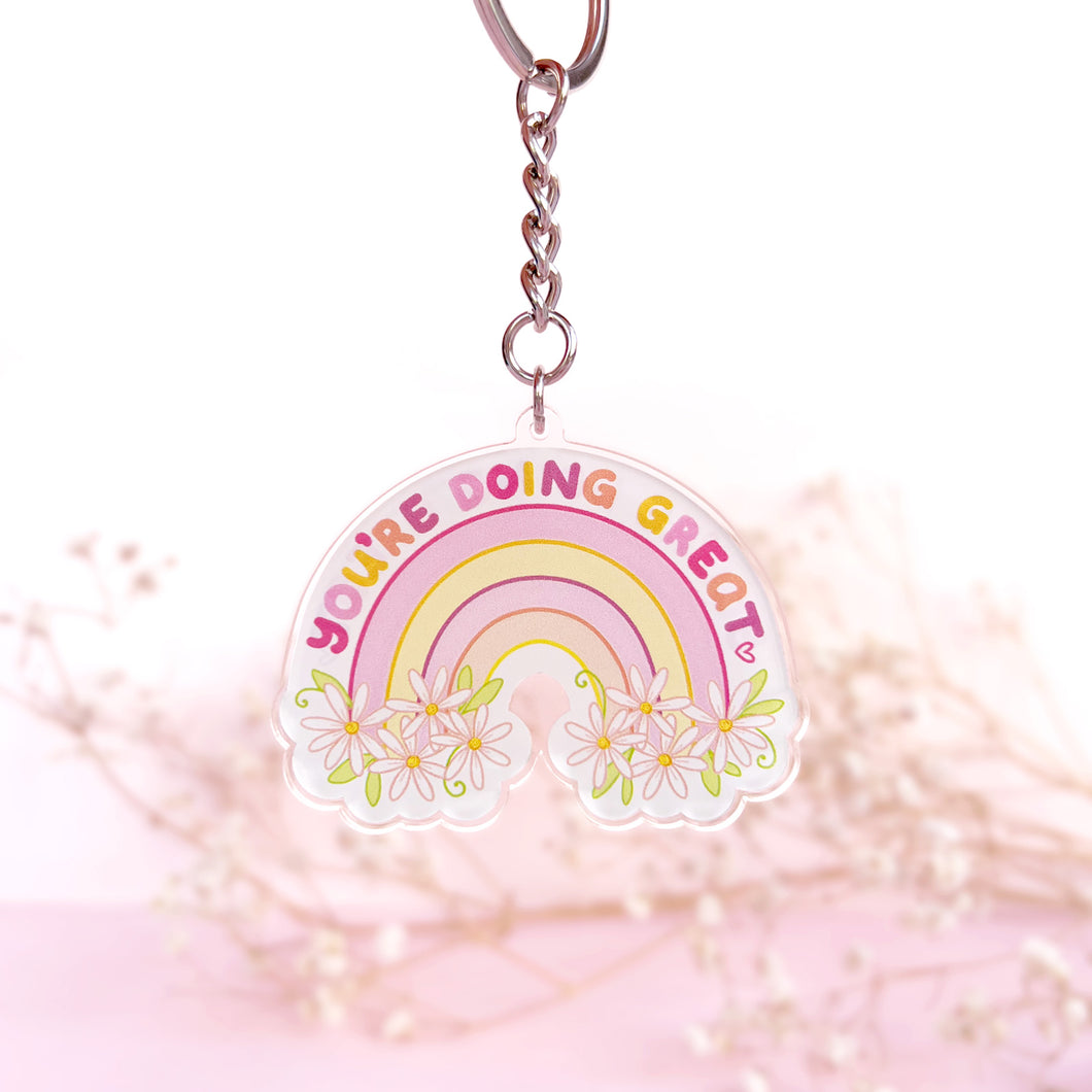 The Rosy Redhead Acrylic Keychain Rainbow Positivity