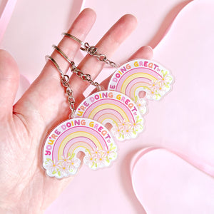 The Rosy Redhead Acrylic Keychain Rainbow Positivity