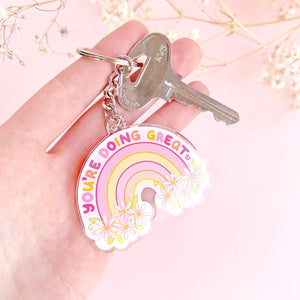 The Rosy Redhead Acrylic Keychain Rainbow Positivity