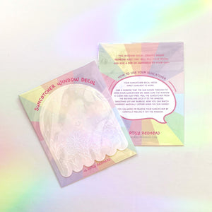 The Rosy Redhead Suncatcher Decal Packaging